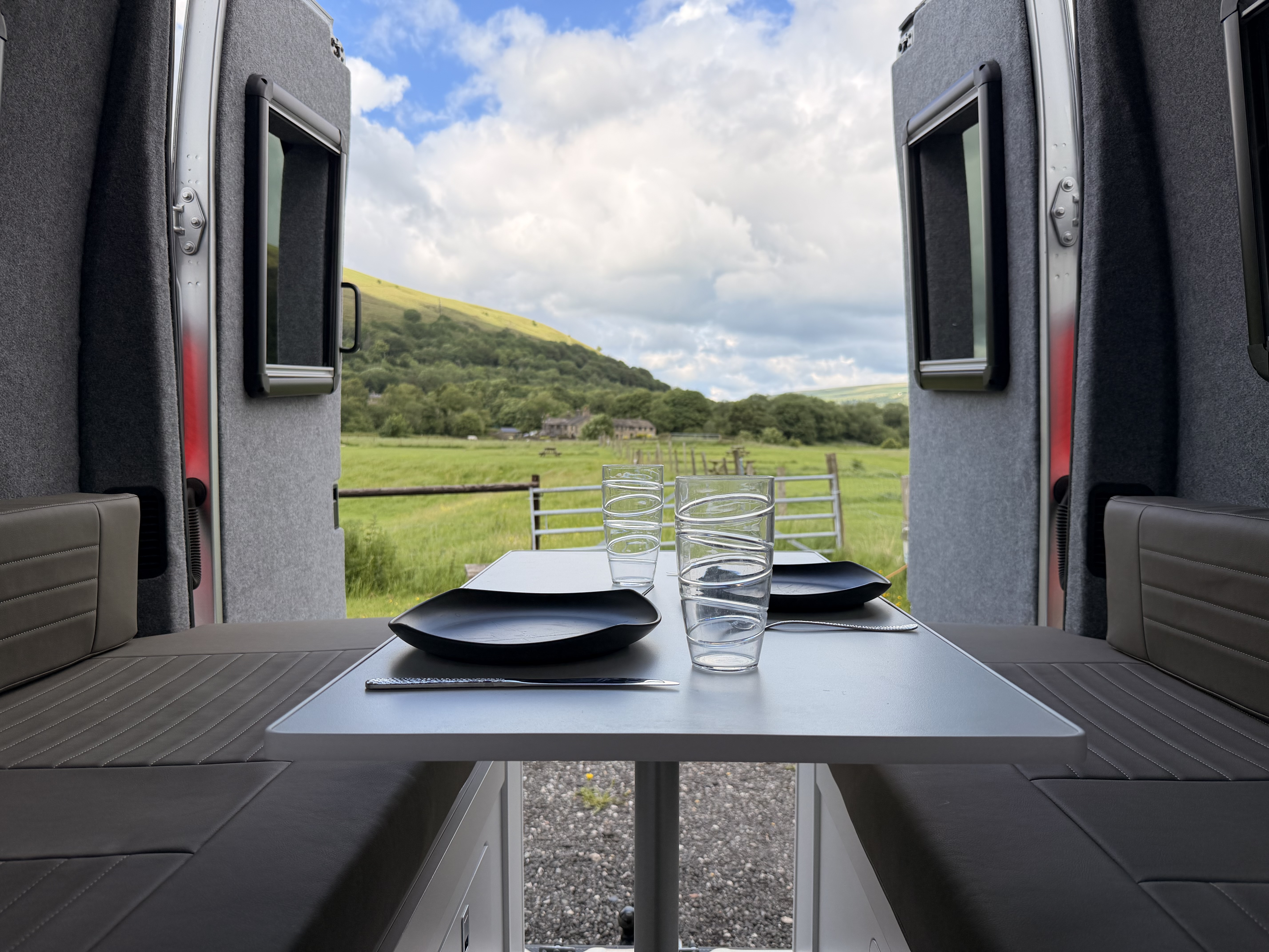 Peaceful campsite with Pennine hills in the background